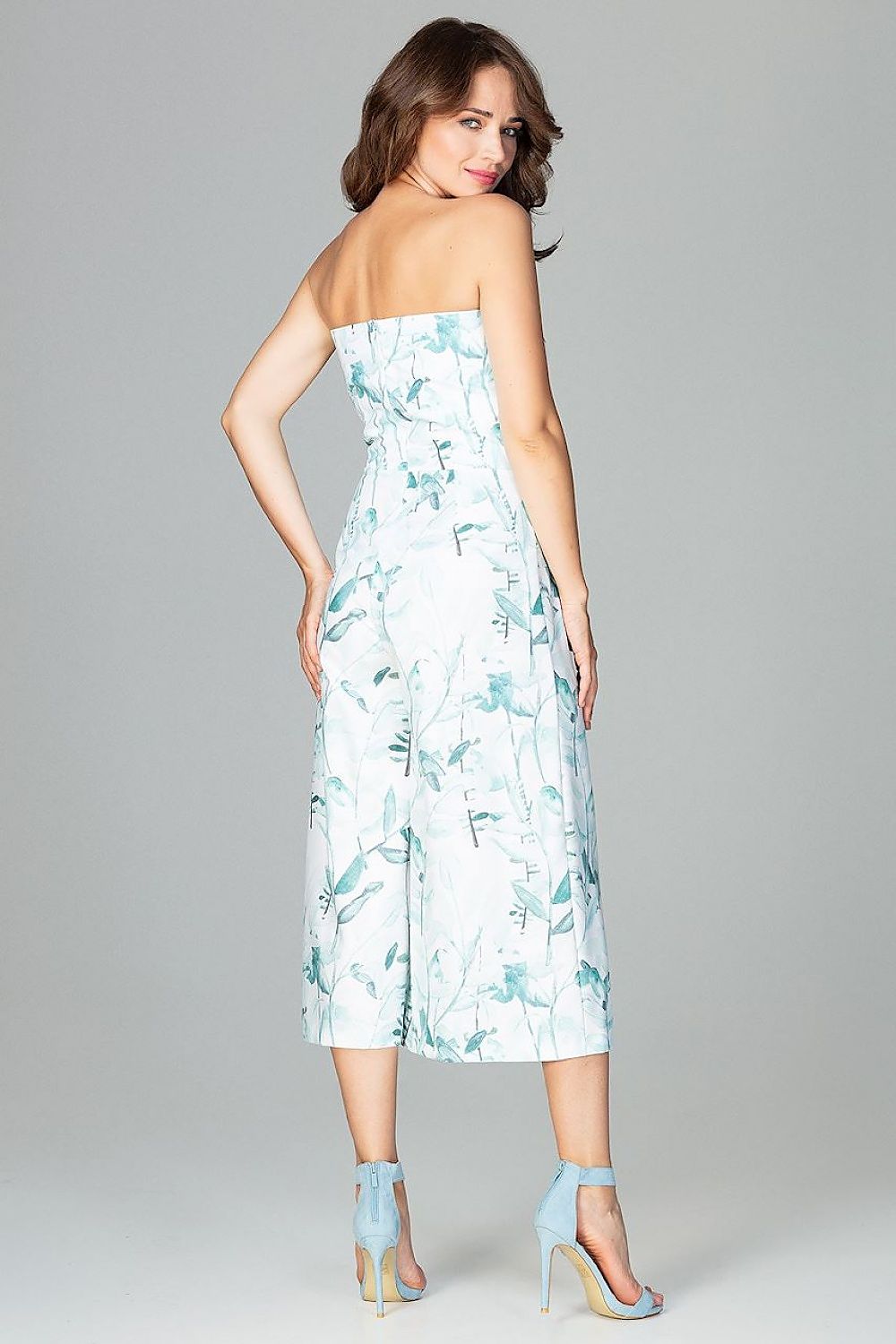 Modern strapless jumpsuit with oriental pattern, corset in culotte style, and soft elastic fabric, offering a sexy and elegant look.