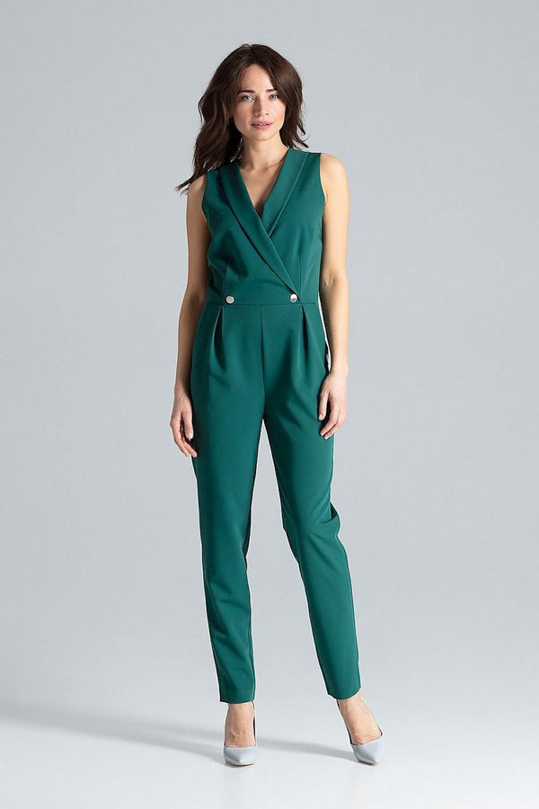 Classic sleeveless jumpsuit with lined narrow lapels, envelope neckline, decorative silver-colored metal snap fasteners, and slanted side pockets.