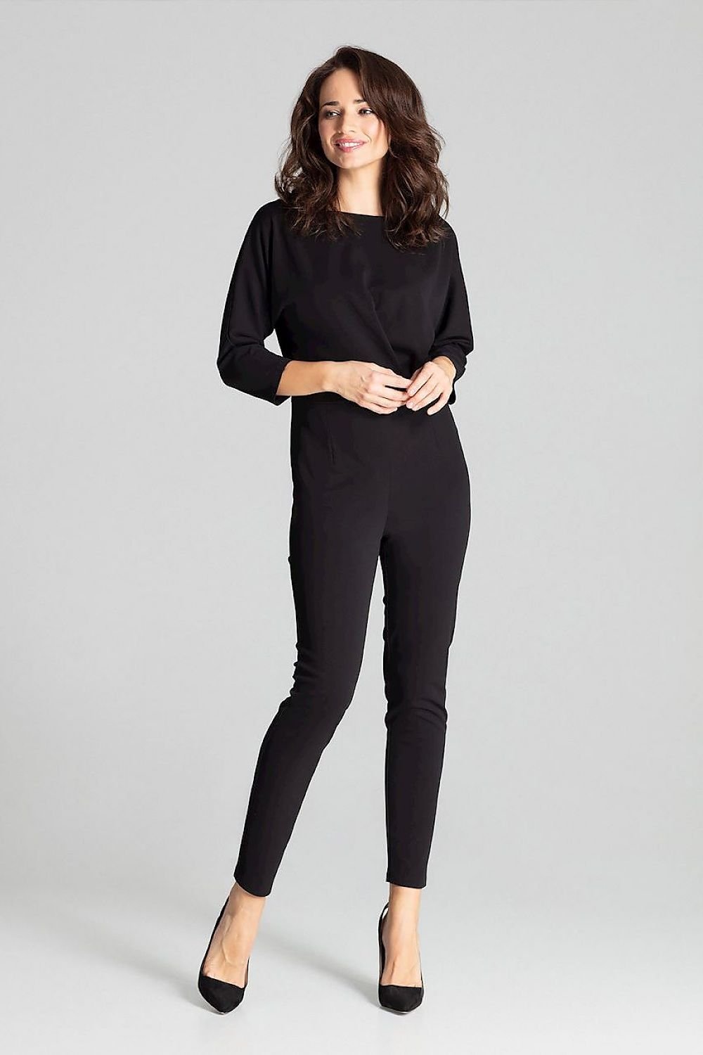 Black 3/4-sleeved jumpsuit with semi-circular neckline and kimono sleeves.