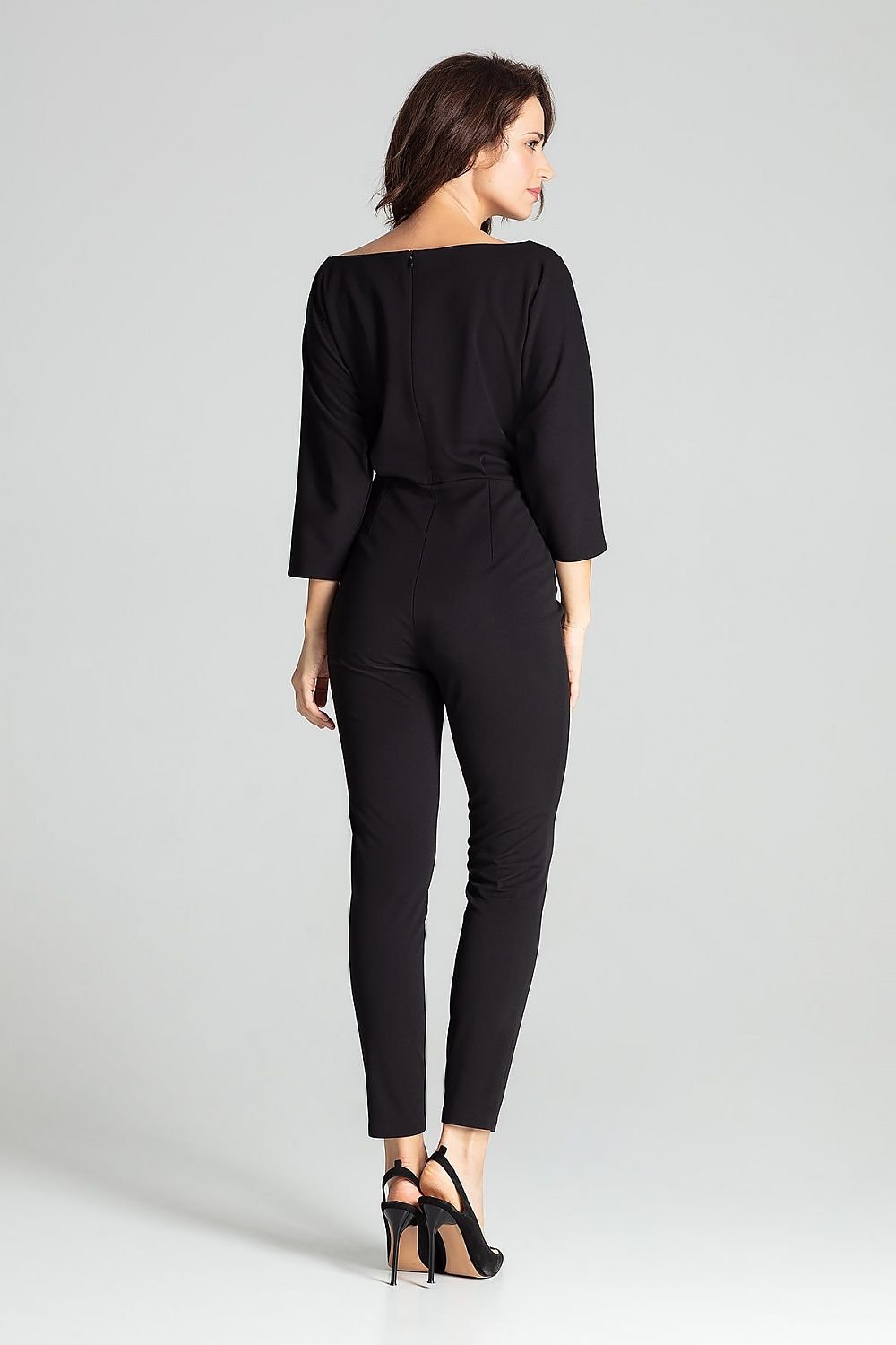 Black 3/4-sleeved jumpsuit with semi-circular neckline and kimono sleeves.