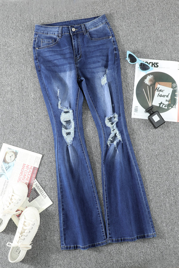 Mid Rise Distressed Flared Jeans - SHIRLYN.CO